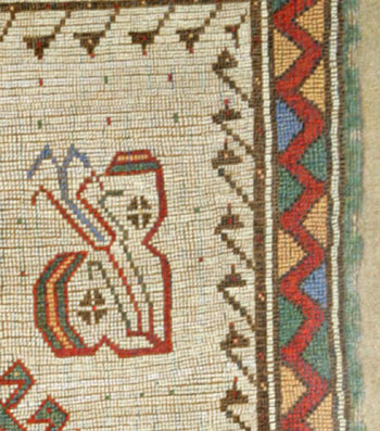 detail of white prayer rug